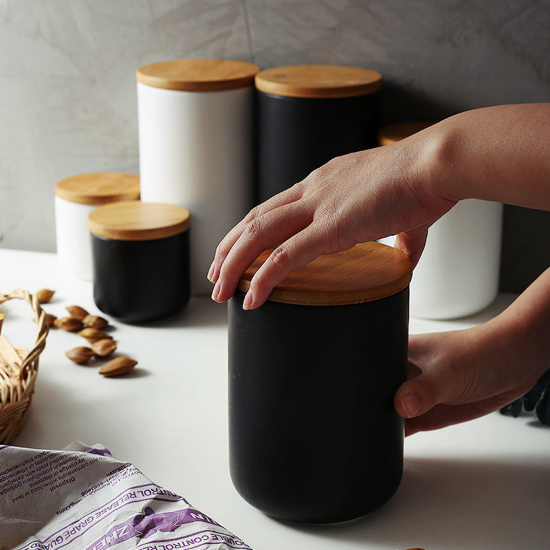 Ceramic spice storage jar with lid for kitchen organization
