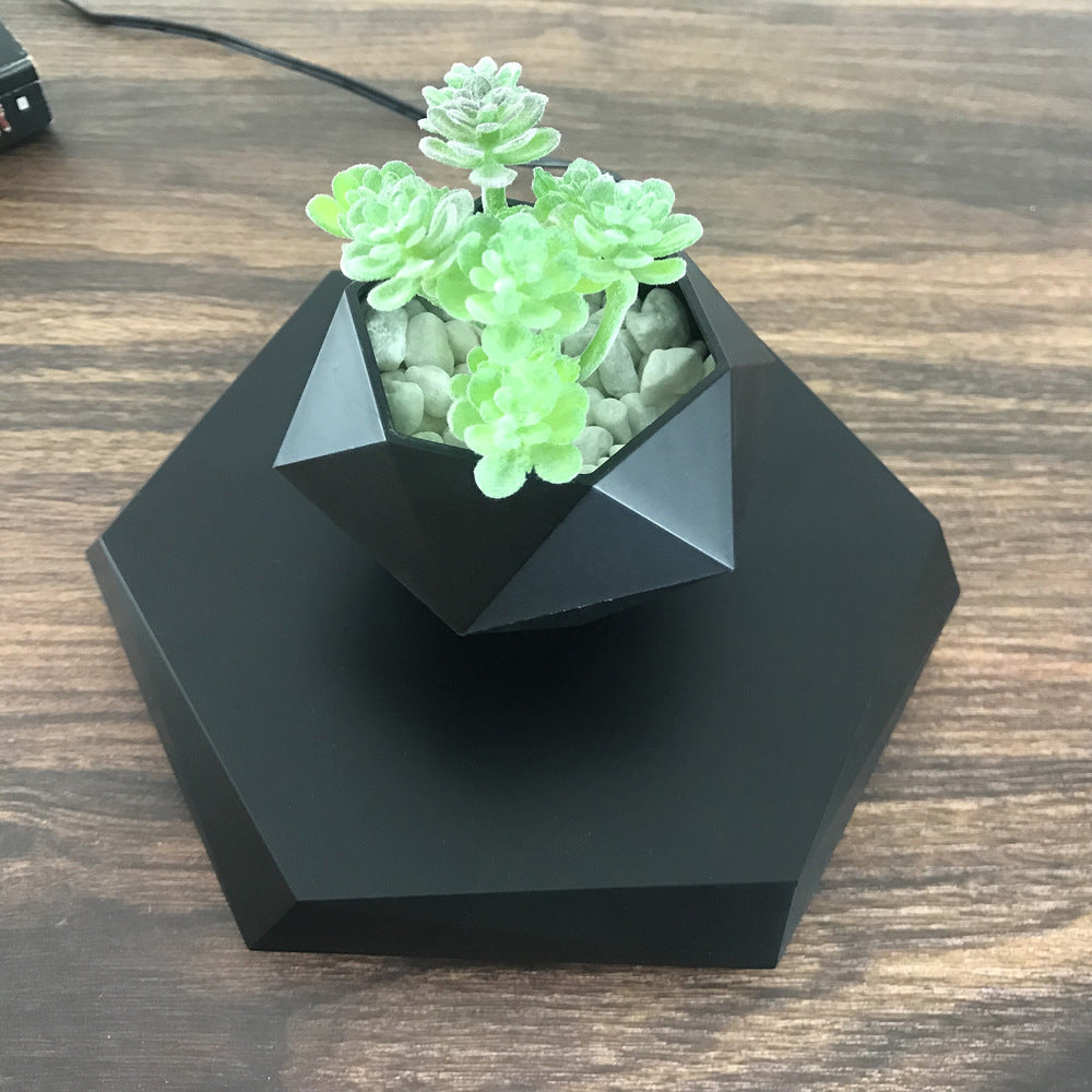 Compact levitating plant pot for desk and office use
