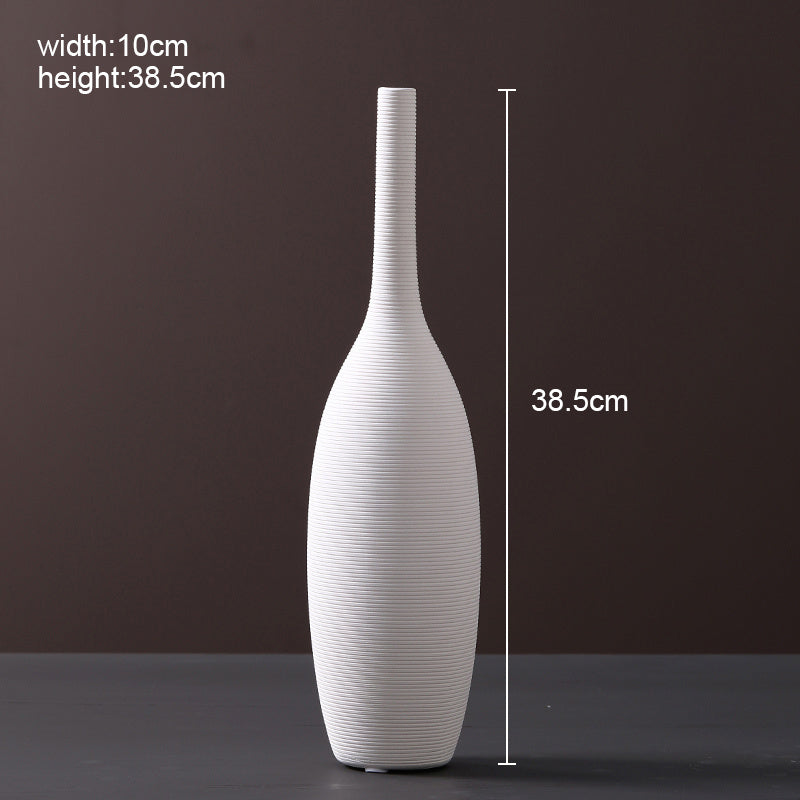 Minimalist white ceramic vase with elegant inlay finish
