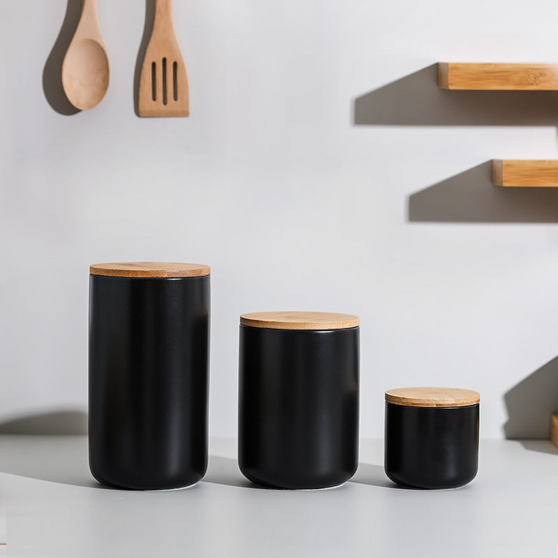Ceramic spice storage jar with lid for kitchen organization
