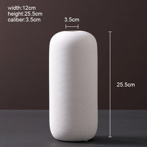 Minimalist white ceramic vase with elegant inlay finish
